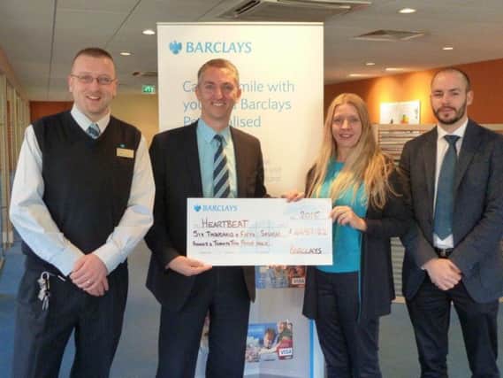 Barclays staff members  Jon Sear, branch Mmanager Chris Nelson, Shirley Murrell and Chris Berends Sheriff donated nearly 6,000 to Heartbeat