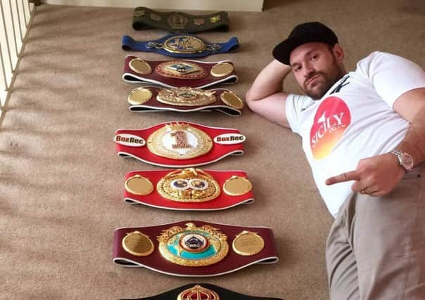 Tyson Fury posted this picture on Twitter shortly before vacating his world titles.