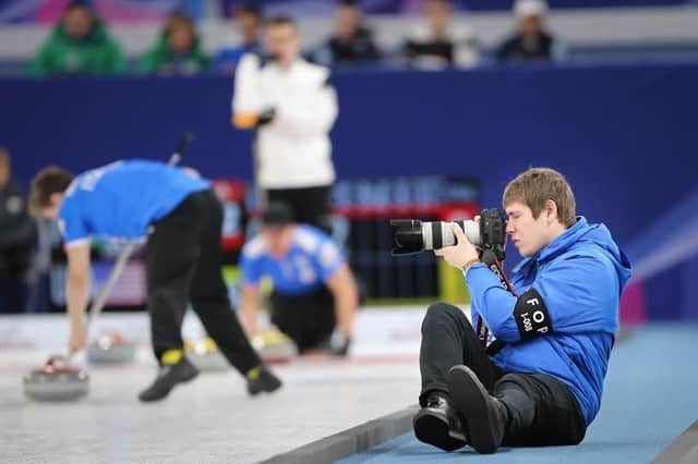 Second year photography student Tom Rowland in action on his dream placement at the World Junior Curling Championships in South Korea. Photo : WCF/Richard Gray