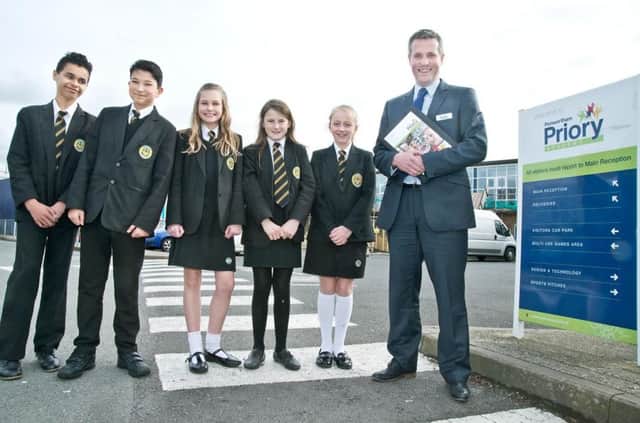 Matt Eastham, headteacher at Priory Academy, Penwortham, with some of the pupils
