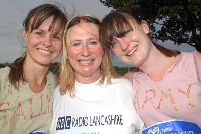 Pictures Martin Bostock
The 2004 Race for Life at Lawson Rd showground.
 Radio Lancashire presenter Sally Naden (centre) with Heather Johnson (left) and daughter Diana.