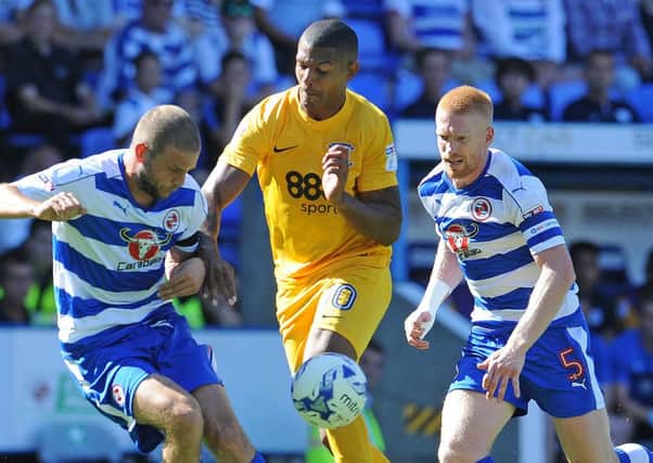 Jermaine Beckford in action for Preston against Reading on the opening day of the season