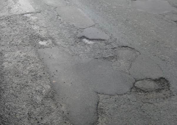 Potholes on Market Place march towards Berry Lane in Longridge