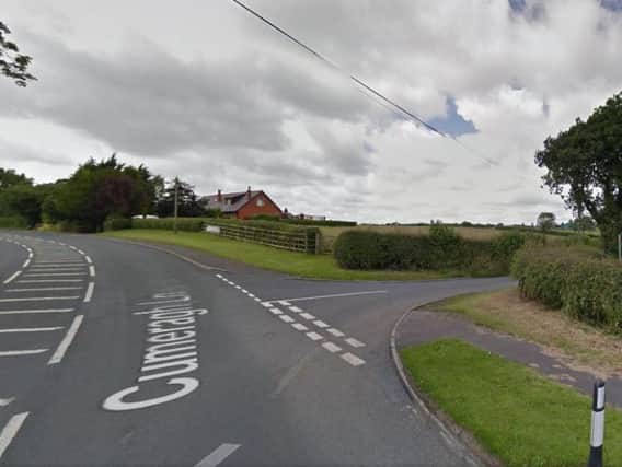 A man has been killed after a crash with a car on Back Lane, Whittingham.