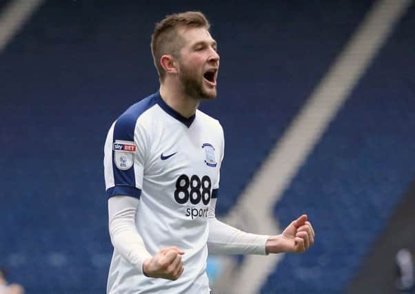 Tom Barkhuizen celebrates after scoring the third goal in the victory against Reading