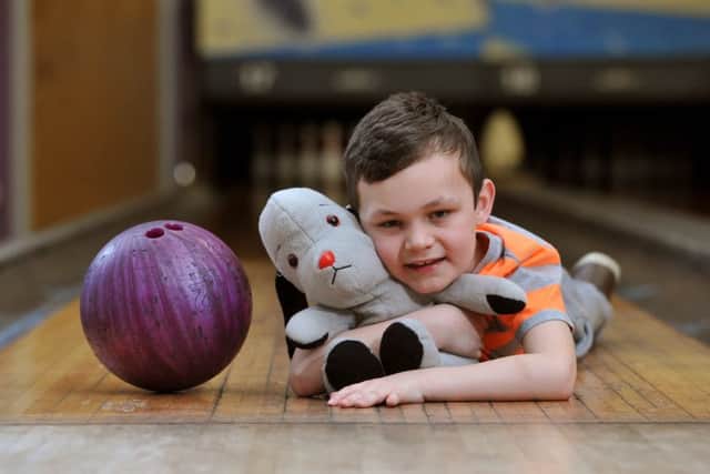 Charlie Neilsen is reunited with his favourite cuddly toy Sweep
