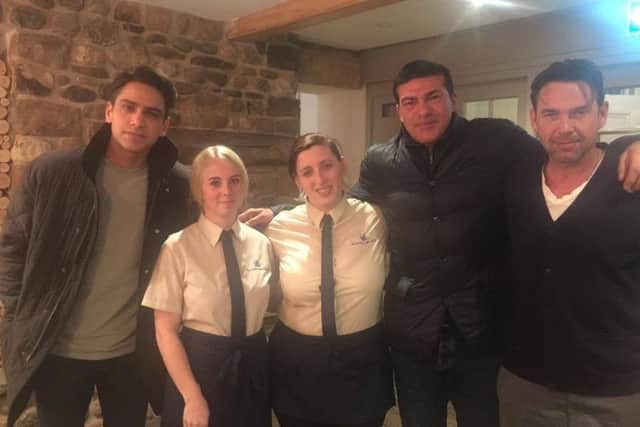 Actors Luke Pasqualino, Tamer Hassan and Dougray Scott with Morecambe Hotel staff Natasha Penny and Carmel Woodhead.