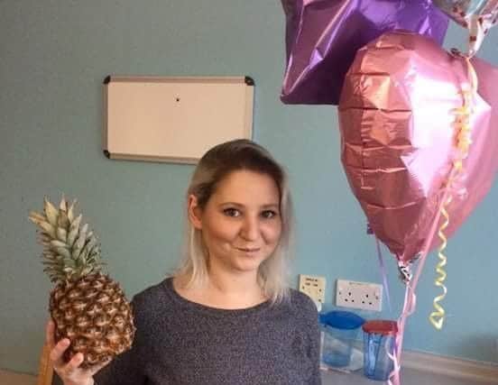 Claire Hamilton when she was leaving St James Hospital in Leeds after her liver transplant with balloons and a random pineapple she was given