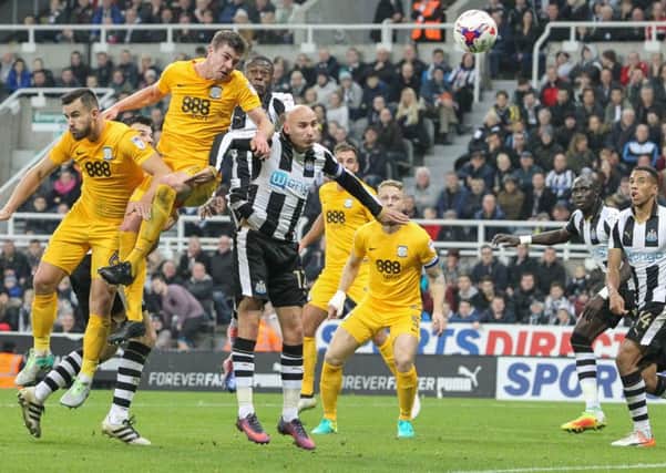 Paul Huntington heads goalwards during PNE's EFL Cup hammering at St James' Park earlier in the season.