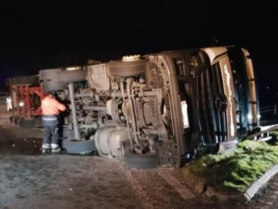 An exit roundabout on the northbound M6 has been blocked after a lorry overturned last night.