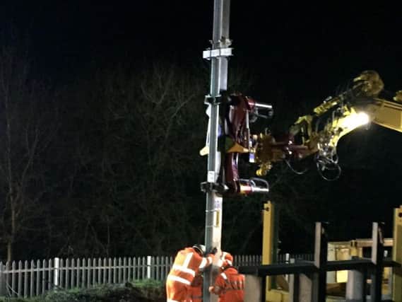 Overhead power line stanchion being put up near Bolton