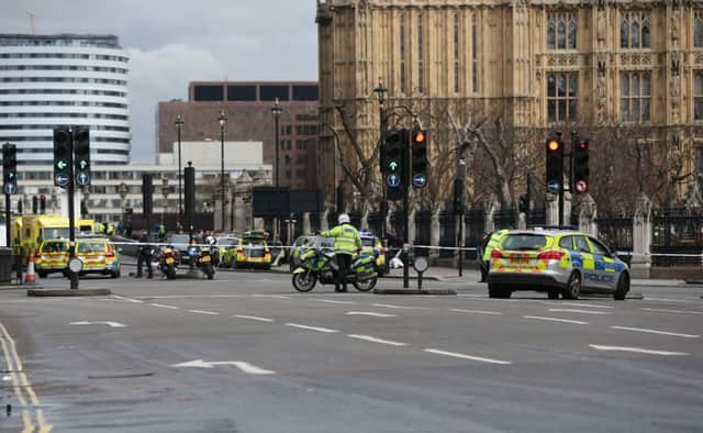 Police close to the Palace of Westminster, London, after policeman has been stabbed and his apparent attacker shot by officers in a major security incident at the Houses of Parliament. PRESS ASSOCIATION Photo. Picture date: Wednesday March 22, 2017. See PA story POLICE Westminster. Photo credit should read: Jonathan Brady/PA Wire