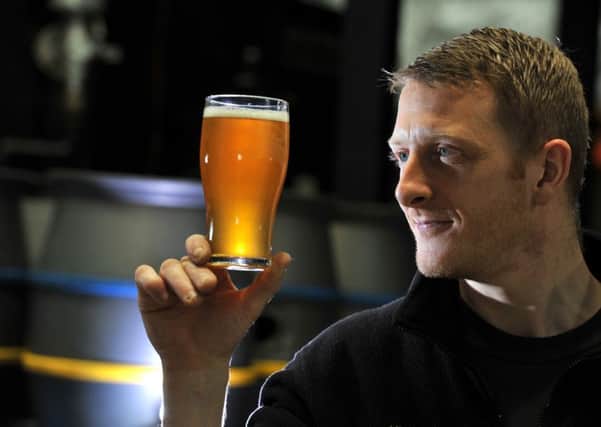 Photo Neil Cross: Cross Bay Brewery's Head Brewer Nick Taylor making award winning Cross Bay Sunset cask ale