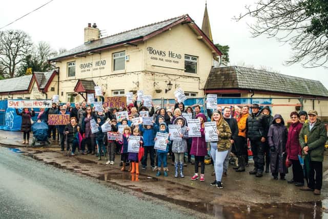 Residents protest against the demolition of The Boar's Head in Barton.