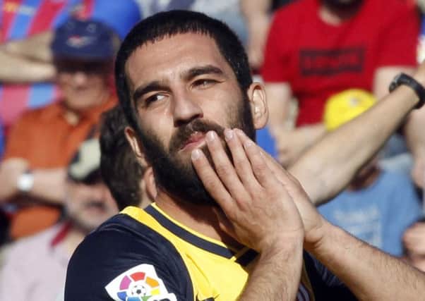 Arda Turan is being linked with a move to Arsenal