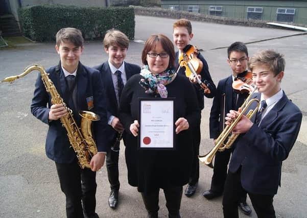 LRGS head of music  Emma Lamb with students