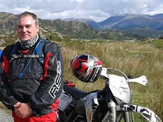 The 51-year-old father was fatally injured after his bike collided with a Ford Transit