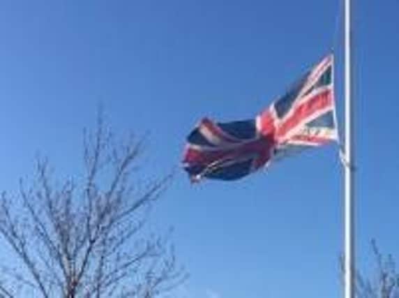 Flags flew at half mast outside Lancashire Police's Divisional Headquarters