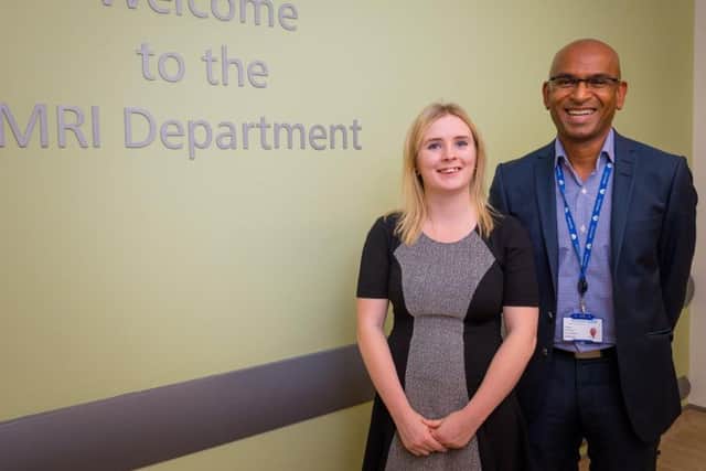 Pat Seed's granddaughter Emma Seed with Dr Prakash Manorharan (The Christie's consultant radiologist and nuclear medicine physician), one of the new scanning rooms