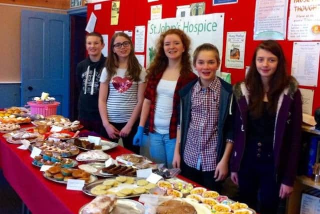 Garstang Youth Council memebrs raised £330 for St John's Hospice at a cake sale organised by Deputy Youth Mayor Bethany Wright Graham at Wesley's on Park Hill Road. Photo shows L to r.
Lucas Brown
Bethany Wright Graham - Youth deputy mayor
Faye Mower,
Oliver Atkinson - Youth Mayor
Myfanwy Salisbury