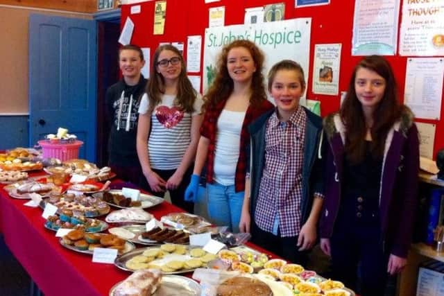 Garstang Youth Council memebrs raised  Â£330 for St John's Hospice at a cake sale organised by Deputy Youth Mayor Bethany Wright Graham at Wesley's on Park Hill Road. Photo shows L to r.
Lucas Brown
Bethany Wright Graham - Youth deputy mayor 
Faye Mower,
Oliver Atkinson - Youth Mayor
Myfanwy Salisbury