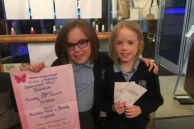 Left to right: Olivia Richardson and Macey Martin had their hair cut for Little Princess Trust and Cancer Research UK