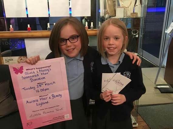 Left to right: Olivia Richardson and Macey Martin had their hair cut for Little Princess Trust and Cancer Research UK