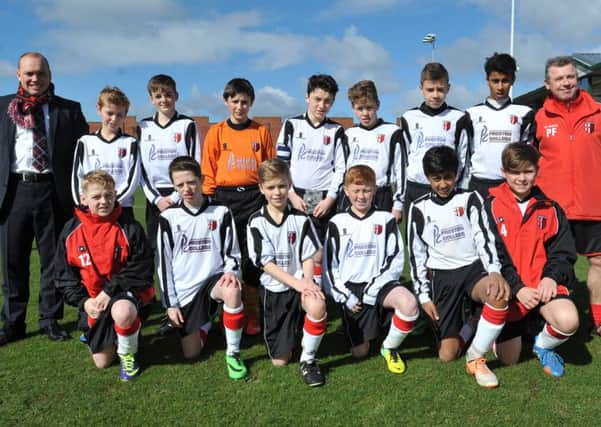 LEYLAND GUARDIAN - JUNIOR MATCH OF THE WEEK - SPORT
Cadley FC team picture, back row from left, manager Danny Maddox, Jack Ormsby, Lewis Grant, Kieran Houghton, William Pitt, Sam Maddox, Daniel Houston-Cookson, Jaay Marolia, Assistant Paul Fitzgerald 
 front row from left, Jack Holding, Dylan Crossey, Lewis Culshaw, Bradley Smith, Raiess Patel and Ty Rowland -   Football action from Chorley Building Society under 13 Youth Cup, Cadley FC (white kit) take on Carnforth Rangers FC (red kit) at The Lancashire Football Association, The County Ground, Leyland.