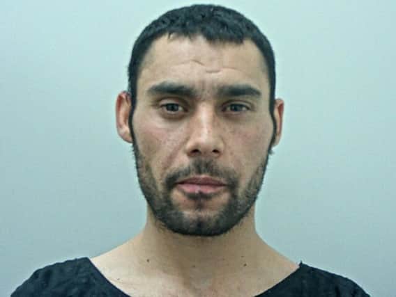 Zsolt Suhaj, 25, entered a number of addresses in the Colne and Nelson areas of Lancashire last year
Pic: Lancashire Police