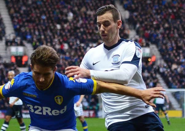 Getting to grips with Leeds United's Gaetano Berardi at Deepdale