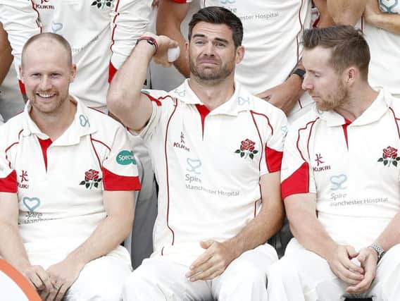 James Anderson (centre) with Karl Brown (left) and Stven Croft (right), during the photocall at Old Trafford Cricket Ground, Manchester.