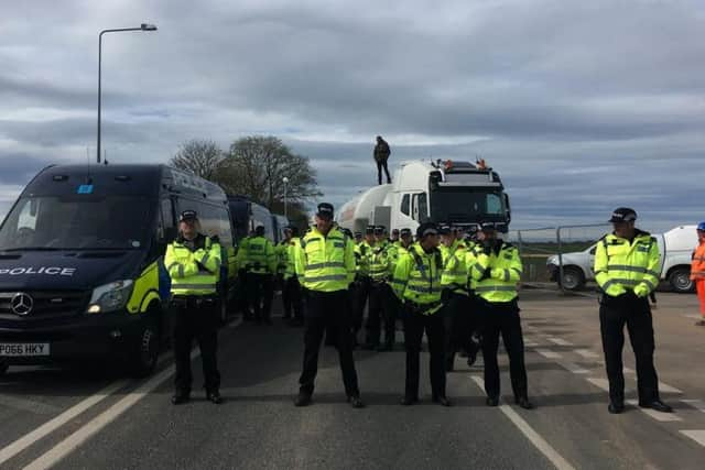 A photograph of a fracking protester on top of a Cuadrilla supply tanker at Preston New Road  taken on April 3 by Ami Roberts.