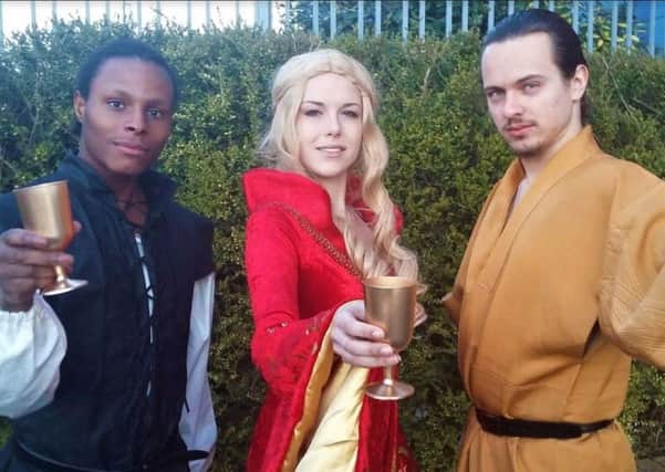 UCLan actors Andre Jenkins, Tamarea Kramer abd Brian Blake in rehearsal for the univeristy's Game of Thrones-themed murder mystery night.
