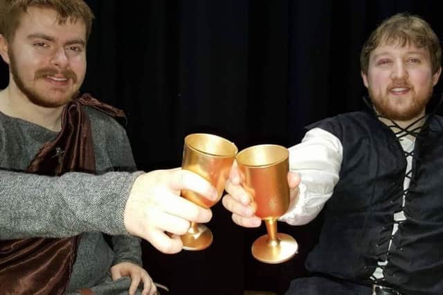 Joesph Harper and David Eades cheers in their Game of Thrones costumes ahead of the univeristy's murder mystery event.