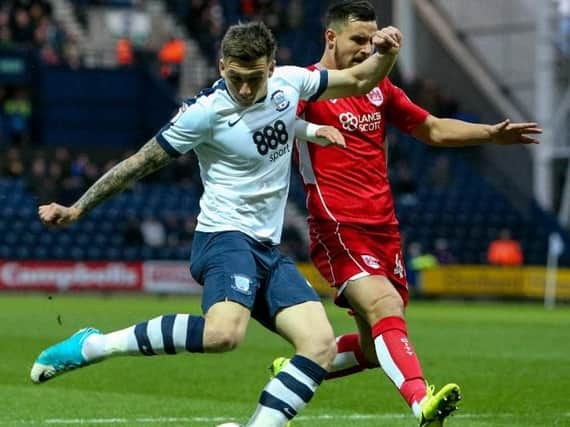 Jordan Hugill comes under pressure from the returning Bailey Wright.