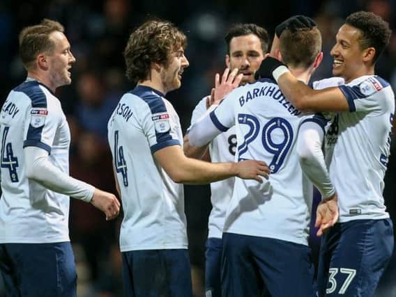 Tom Barkhuizen is congratulated on opening the scoring.