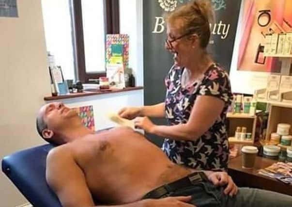 Nick Tofalos, principal ofGarstang Osteopathic Clinic, had the hair waxed from his chest to support his long-term patient and friend Luke Carter.