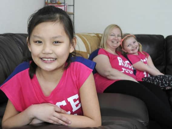 Angela Davies is taking part in Race for Life with her daughters ten-year-old Alyssa Davies (left) and seven-year-old Lauren Davies