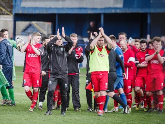 Bamber Bridge acknowledge the fans at the end of the 1-1 draw with Glossop on Saturday