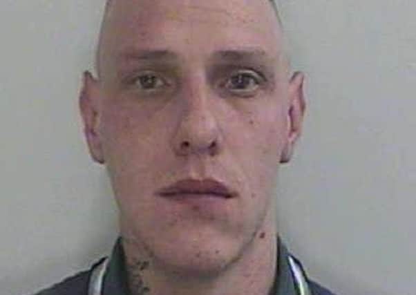 Carl Fox, 28, is wanted in connection with an arson attack in Stephen's Road, Deepdale, Preston