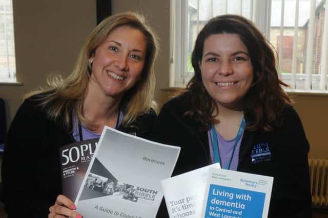 LEYLAND 05-04-17
from left, Kerry Pearson and Olivia Hawkins offer information and advice at the Dementia Hub taking place with Memories Meeitng Place, at Halls for All building, Leyland.