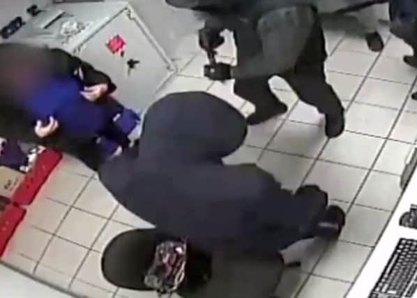 CCTV footage of the robbery taking place