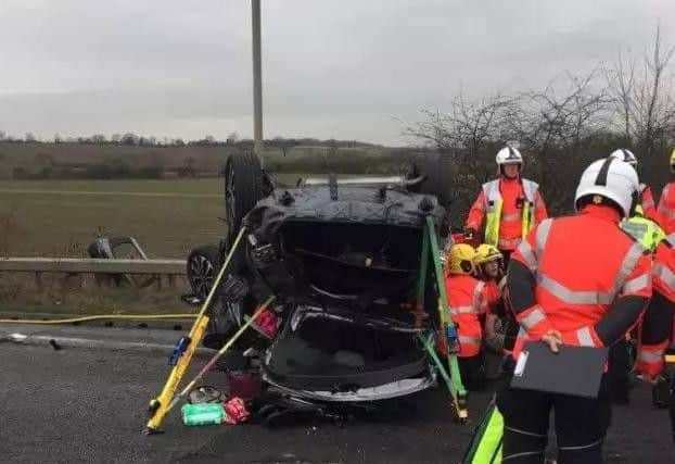 The scene on the A605 where the car overturned - Photo @roadpoliceBCH