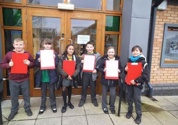 Members of the school council at Lostock Hall Primary are petitioning for  better lighting at a pelican crossing in Brownedge Road