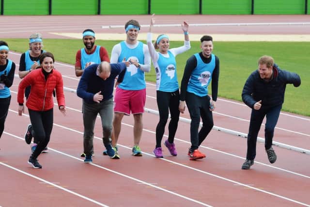 The Duke and Duchess of Cambridge and Prince Harry (right) take part in a race at the Queen Elizabeth Olympic Park in east London, as they joined runners taking part in the London Marathon for their mental health campaign Heads Together. PRESS ASSOCIATION Photo. Picture date: Sunday February 5, 2017. Around 150 competitors who are running for the umbrella organisation will be joined by the royal trio on the London Marathon Community Track at the Queen Elizabeth Olympic Park in east London on Sunday for a training session. See PA story ROYAL Heads. Photo credit should read: John Stillwell/PA Wire