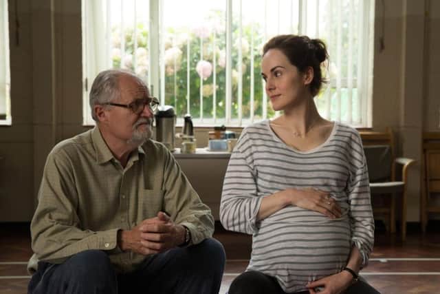 Jim Broadbent as Anthony 'Tony' Webster and Michelle Dockery as Susie Webster