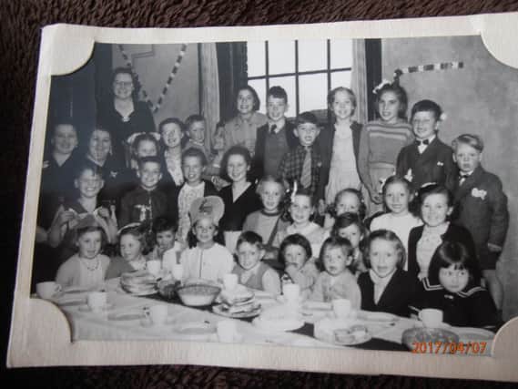 A party for the Queens Coronation at the Railway pub (Leigh Arms) at the top of Chapel Street and Railway Street Chorley in 1953.Ann Wootten (Newby) is on the second row third from left.