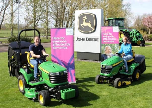 Andy and Kathryn Maxfield, from Inskip, are planning to break the Guinness World Record for driving from John OGroats to Lands End on a lawn tractor, while also raising money for Alzheimers Society.