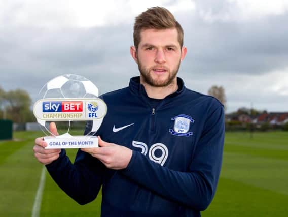Tom Barkhuizen with the Championship goal of the month trophy