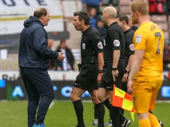 Simon Grayson remonstrates with referee Lee Probert at the final whistle.